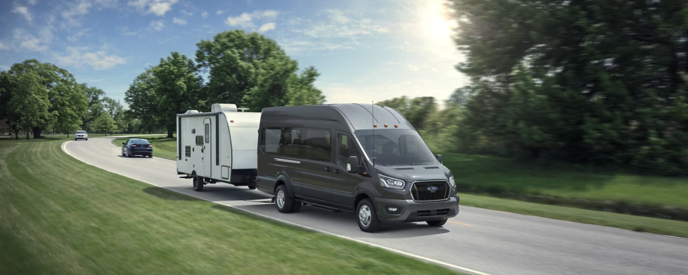 2025 Ford Transit Towing a Camper