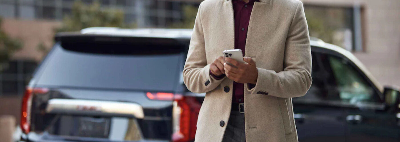 Man Using myGMC Mobile App