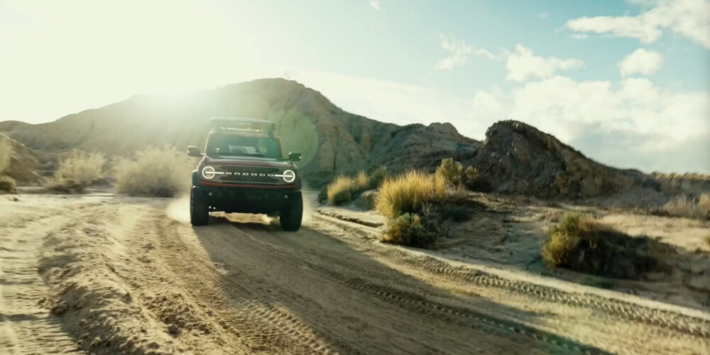 2026 Ford Bronco driving on dirt road