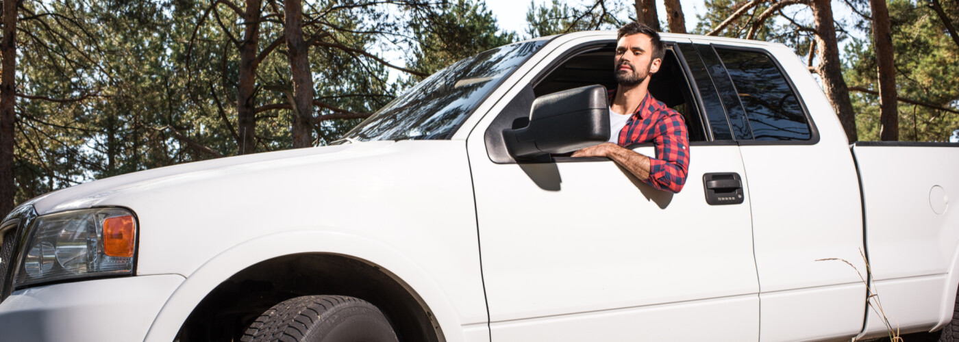 Man In White Pickup Truck Man In White Pickup Truck