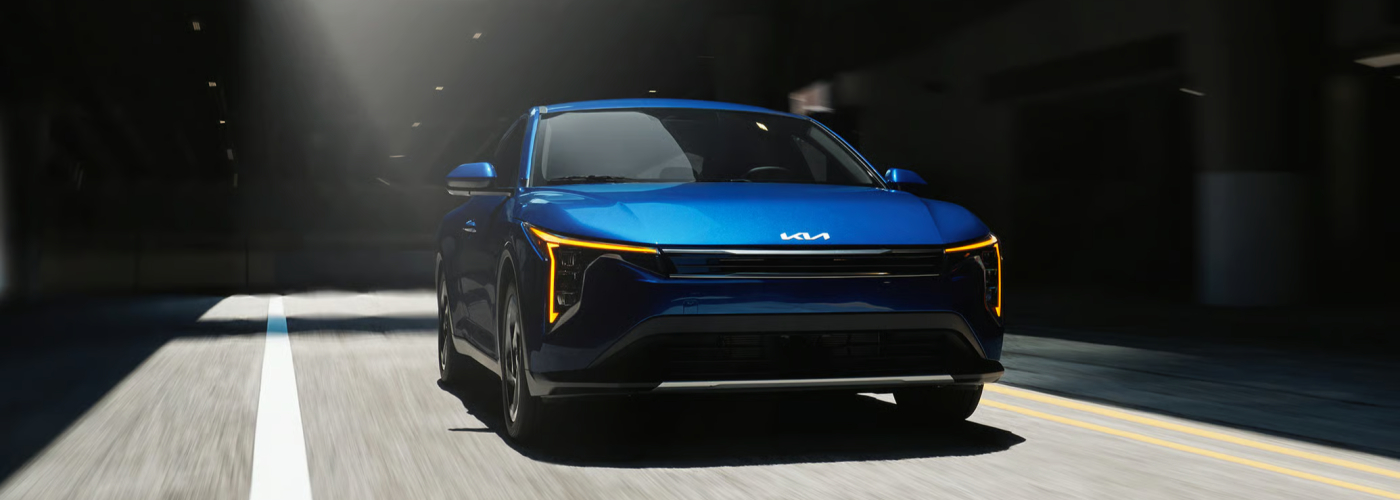 2026 Kia K4 EX in Deep Sea Blue with Gloss Black and Chrome Trim Grille