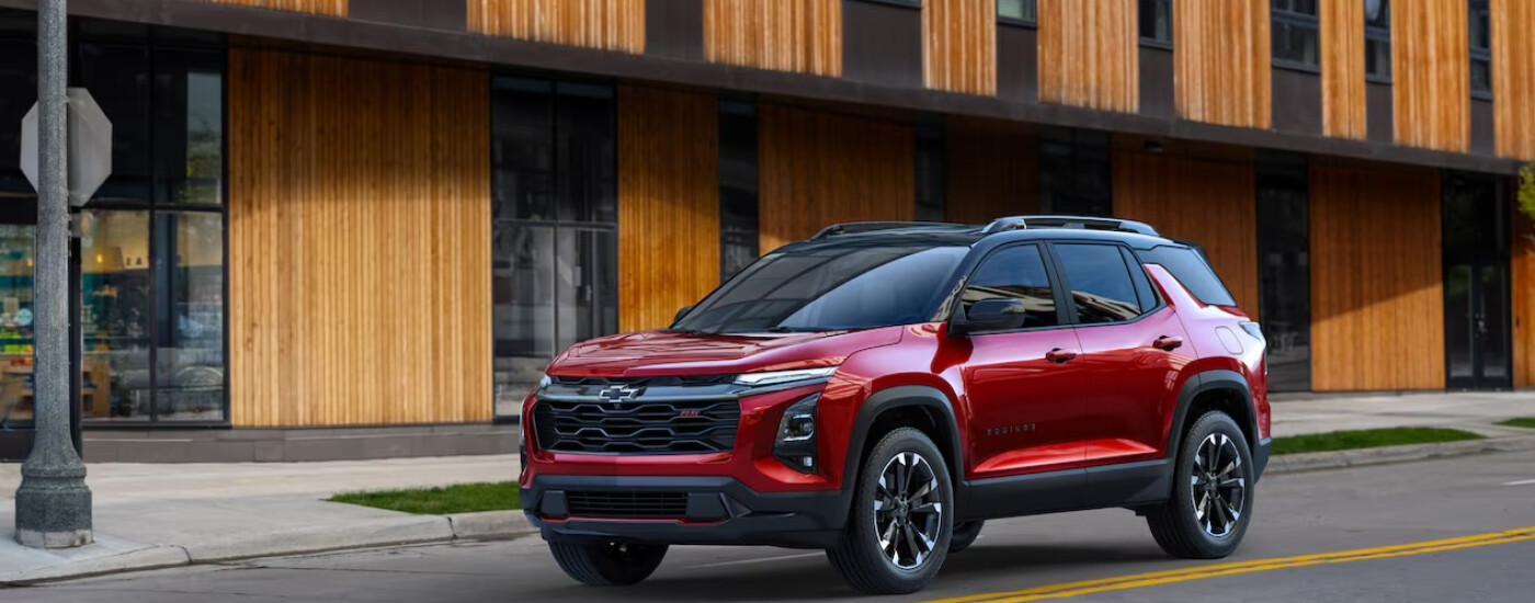Red 2026 Chevrolet Equinox on city street