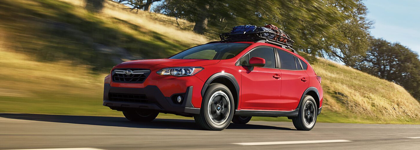 2023 Subaru Crosstrek driving on the street