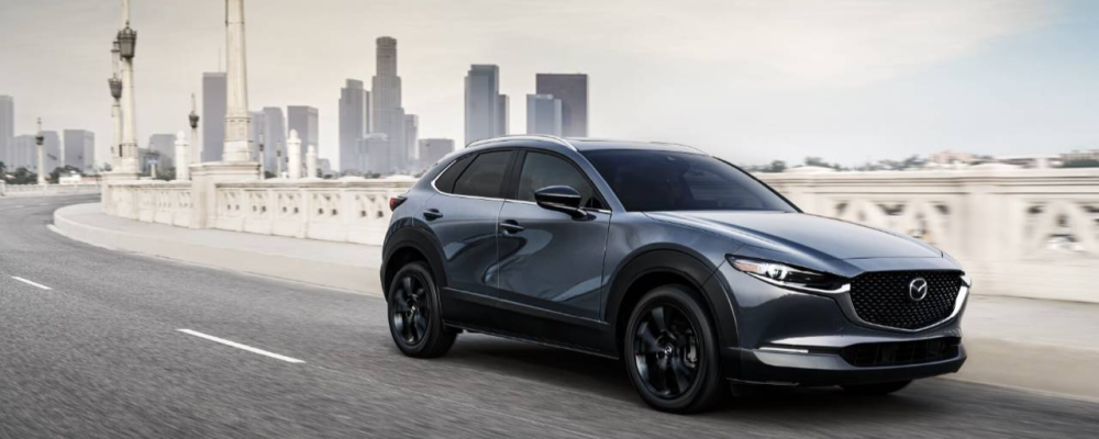 2022 Mazda CX 30 Turbo 2022 Mazda CX 30 Turbo Crossover Gray on street roads