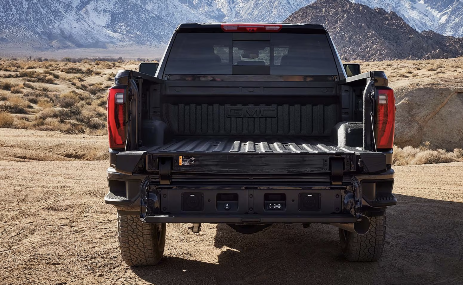 The black Sierra 2500HD has a lined truckbed.