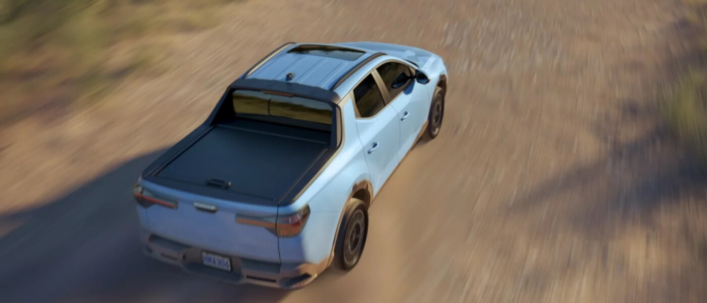 2026 Hyundai Santa Cruz driving through dirt