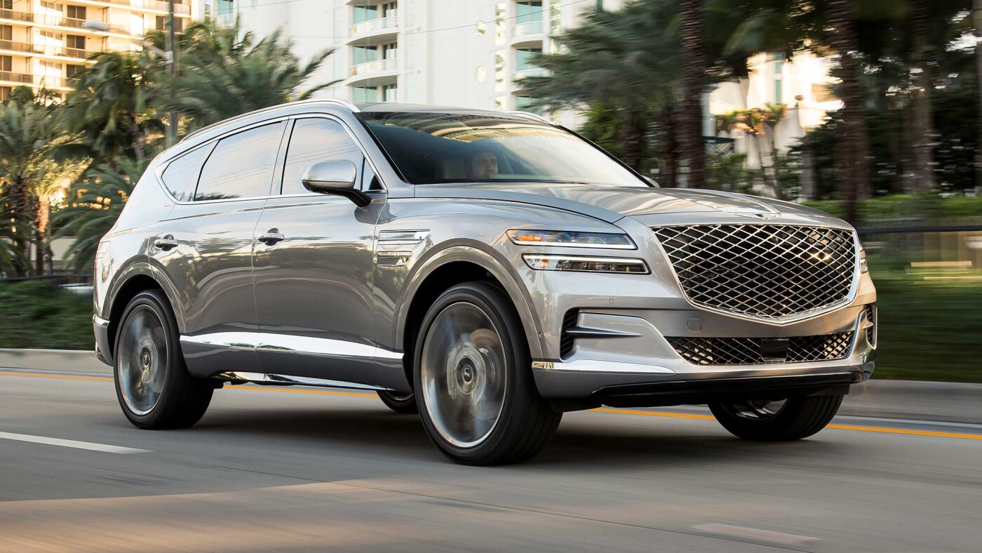 2021 Genesis GV80 racing down highway