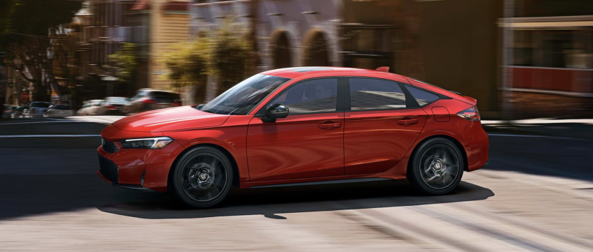 2026 Honda Civic Hatchback Sport Hybrid in Rallye Red Color
