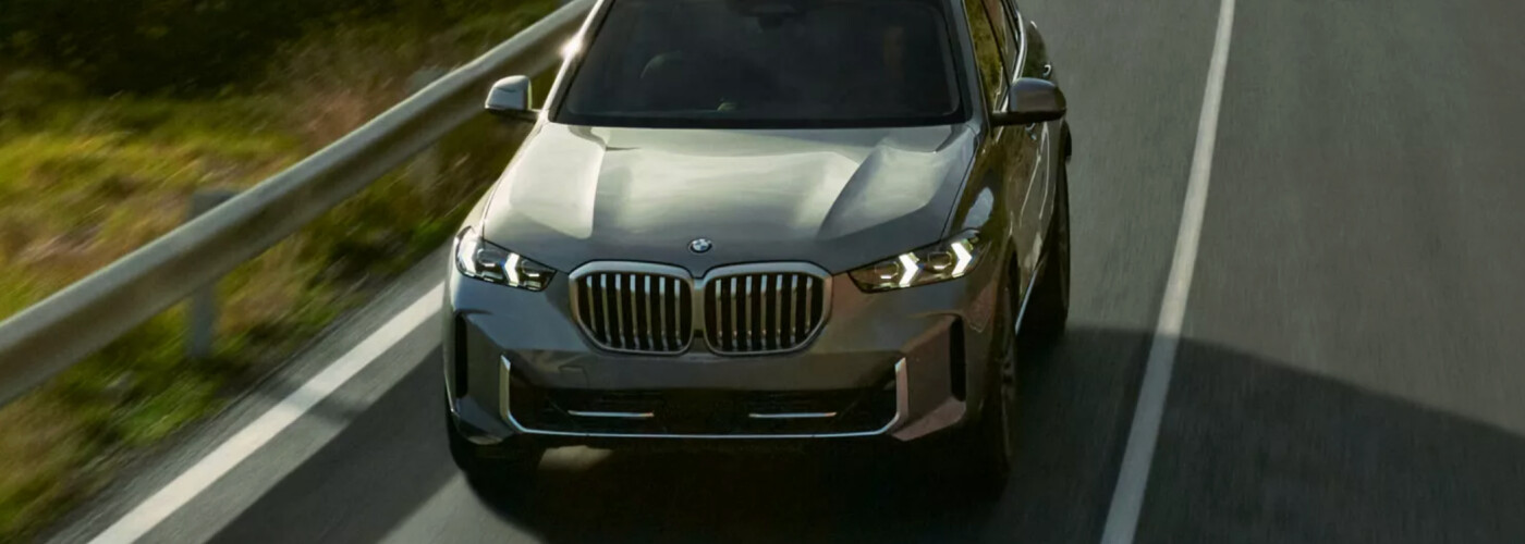 2026 BMW X5 exterior driving on road
