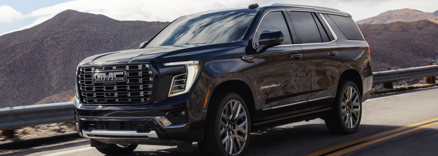 2026 GMC Yukon Denali Driving on Road