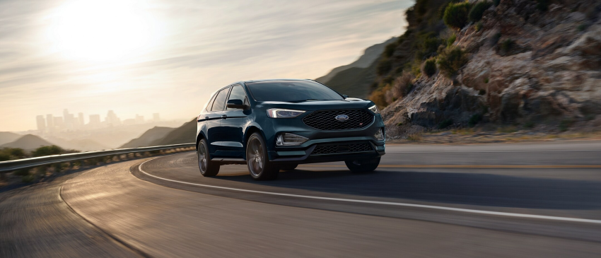 2024 Ford Edge driving by mountainside
