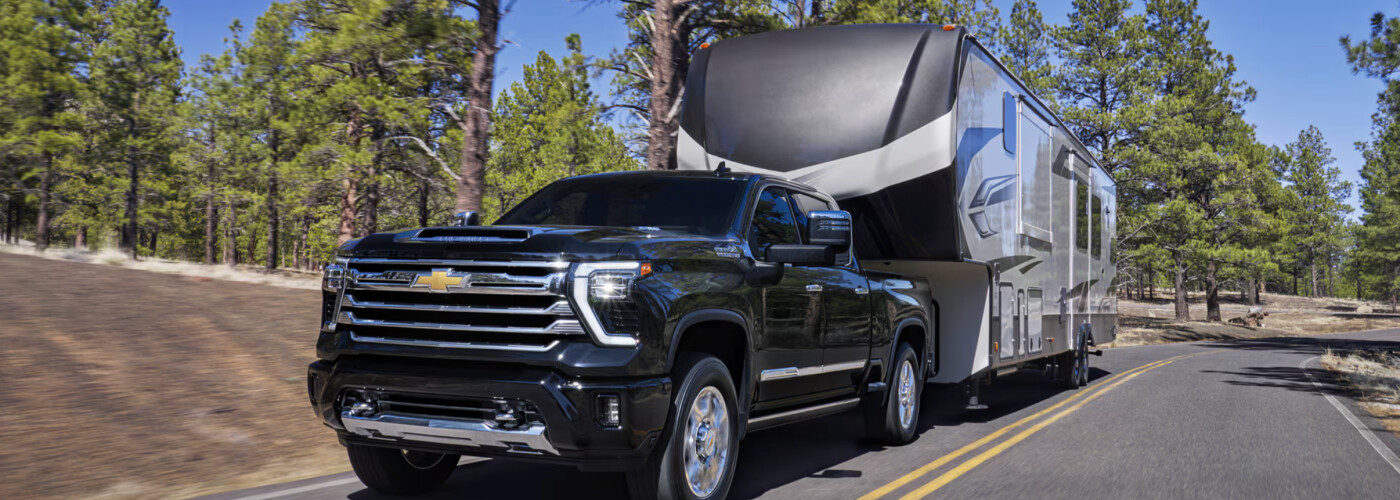 2026 Chevrolet Silverado 2500HD towing recreational vehicle