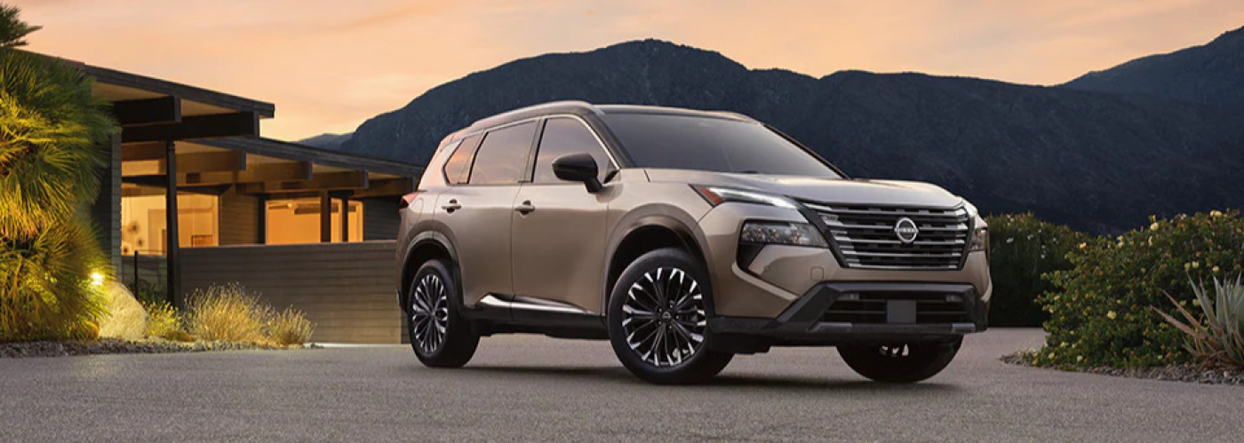 2026 Nissan Rogue in front of a sunset