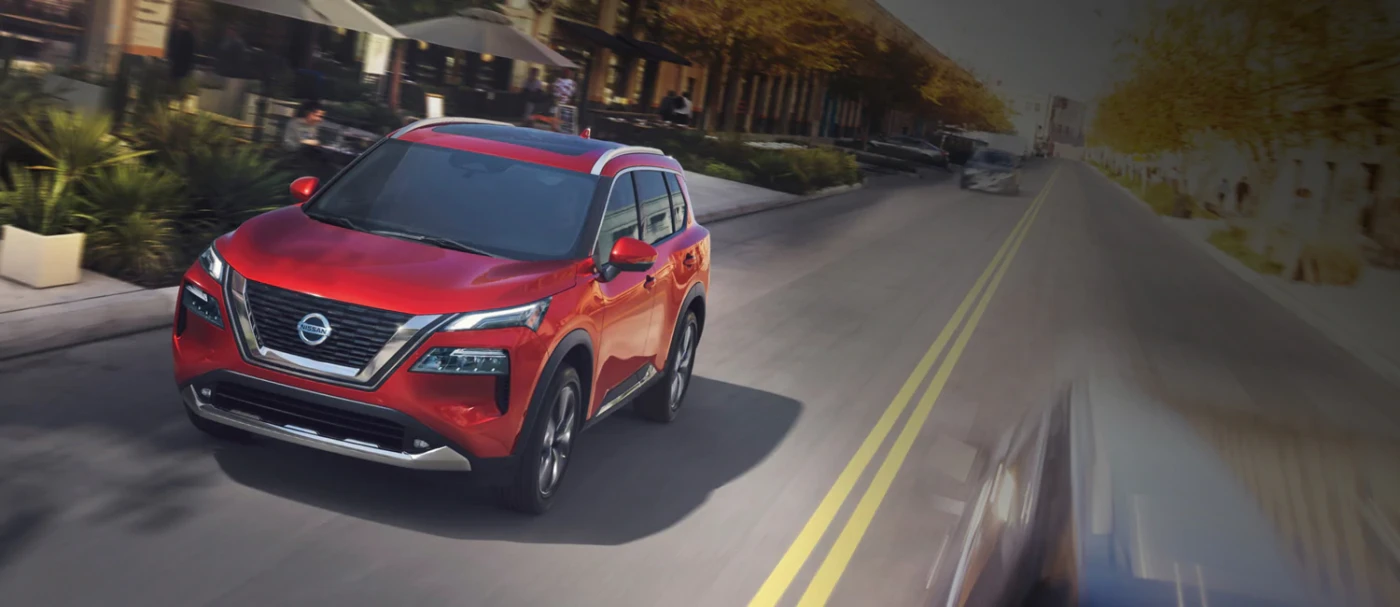 2021 Nissan Rogue driving down road