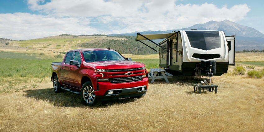 2022 Chevy Silverado 1500 LTD Parked Next to Camper