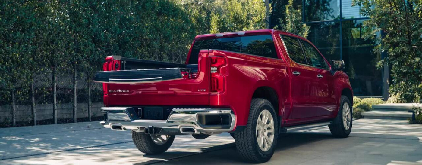 Red 2026 Chevy Silverado 1500 with tailgate down 