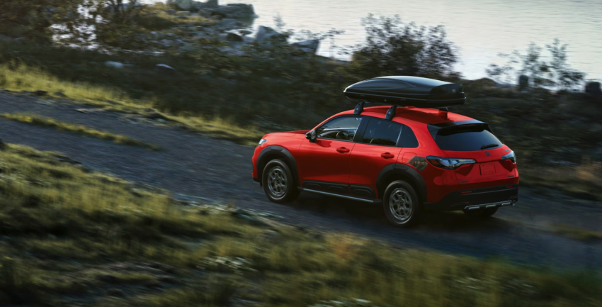 2026 Honda HR-V Sport with Available AWD and Honda Genuine Accessories shown in Milano Red
