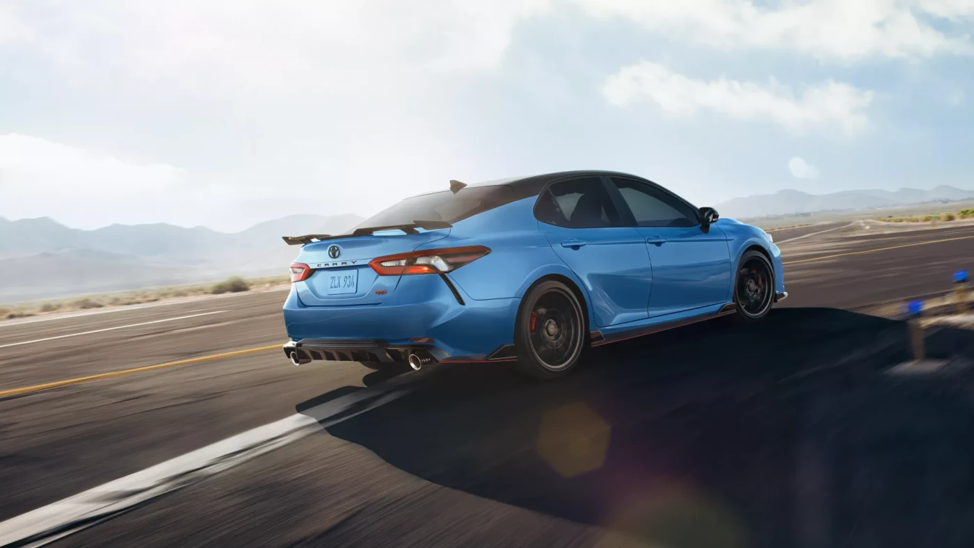 Blue Camry TRD with Spoiler on Road
