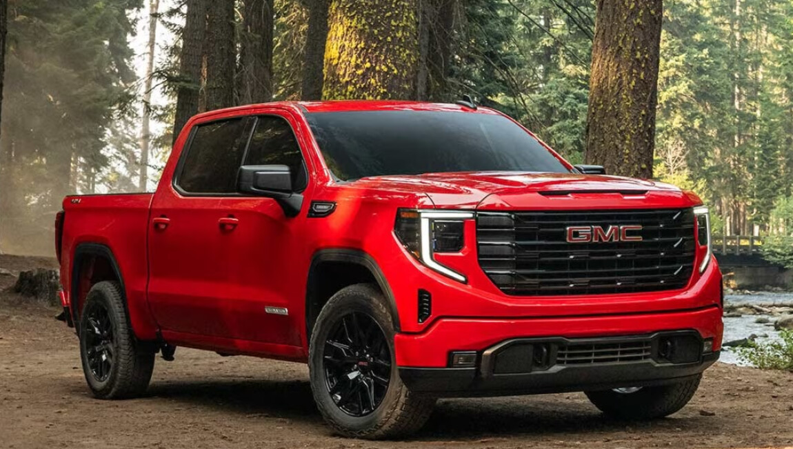 Red 2026 GMC Sierra 1500 in the woods