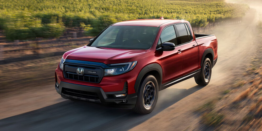 2025 Honda Ridgeline driving on a dirt road