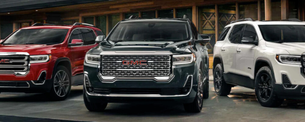 2023 GMC Acadias sitting in a parking lot